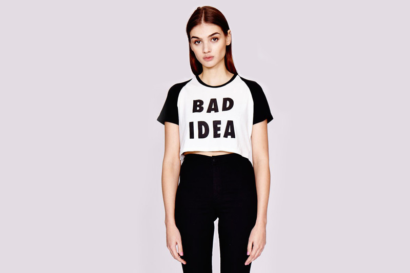 Lazy Oaf – dámské bílé tričko (top) s potiskem „Bad Idea“, černé rukávy | Dámské oblečení