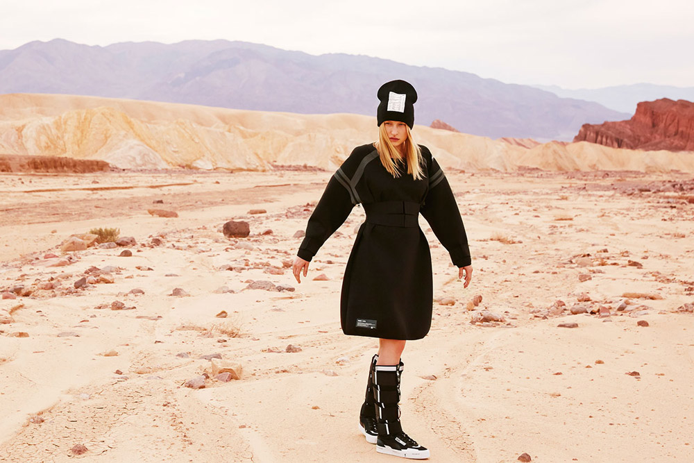 PUMA x UEG — Gravity Resistance — dámské futuristické černé šaty — futuristické vysoké tenisky, kozačky, černé — lookbook