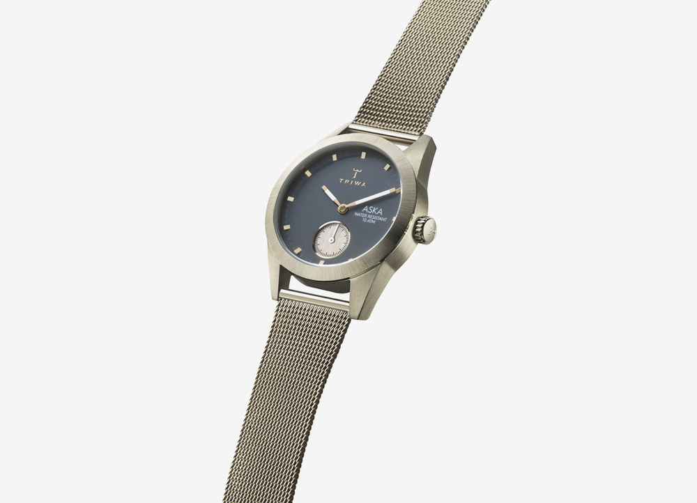 Triwa Aska — Ash — dámské hodinky — náramkové — ručičkové — ocelové — zlaté — šedý ciferník